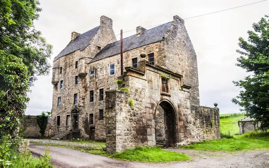 A stone tower house in Scotland used as an Outlander filming location